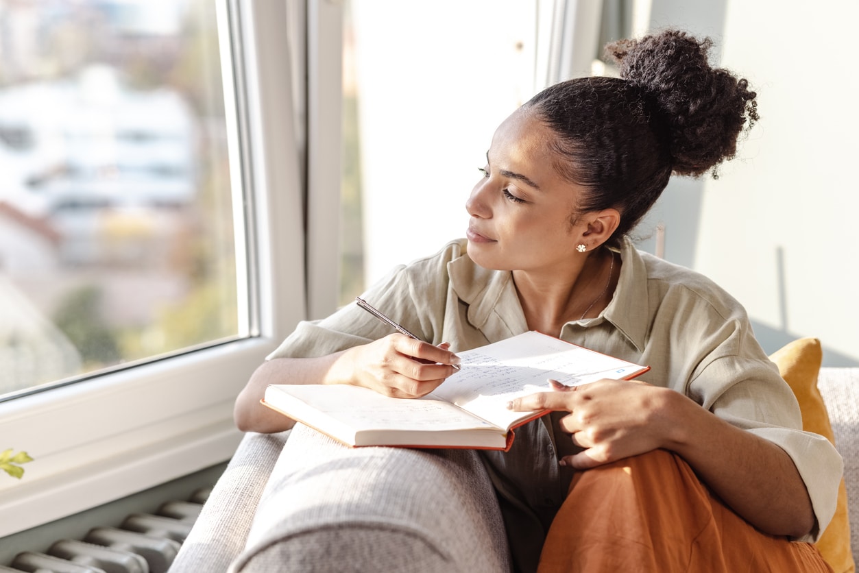 woman journaling for self forgiveness