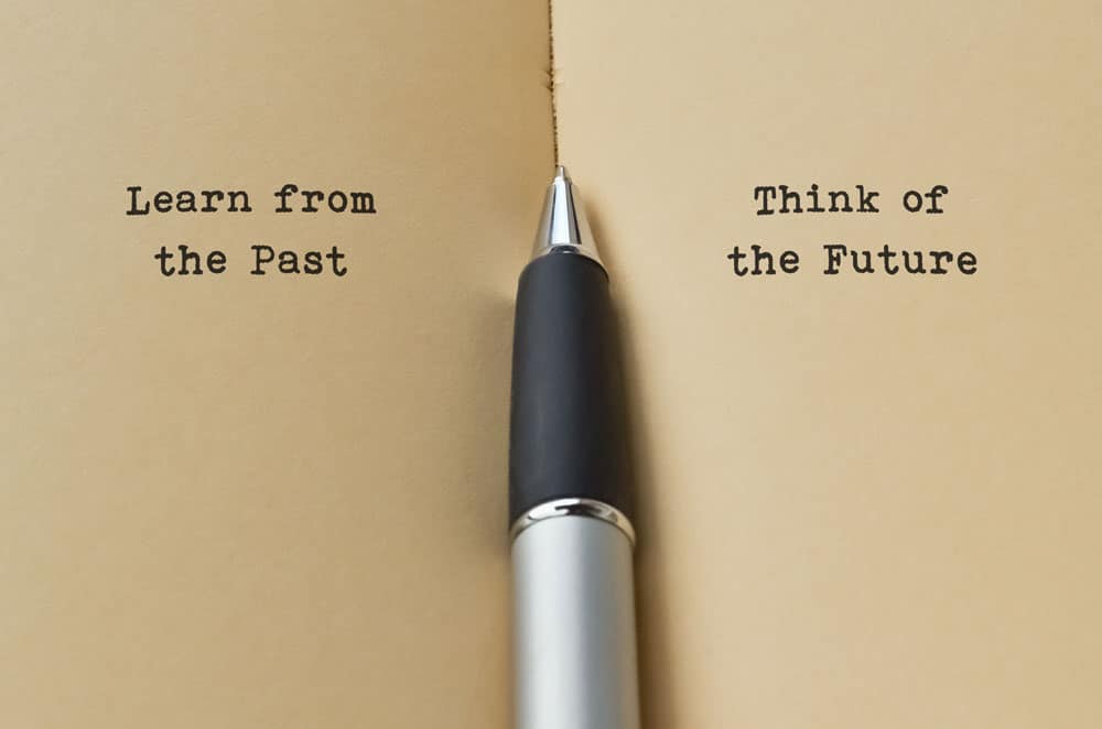 Words saying "Learn from the Past, Think of the Future"