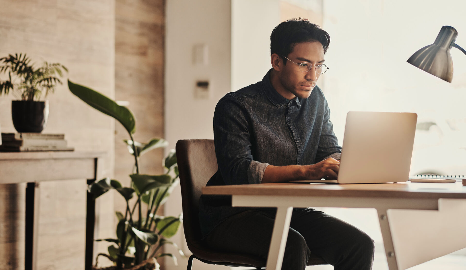 man working on laptop