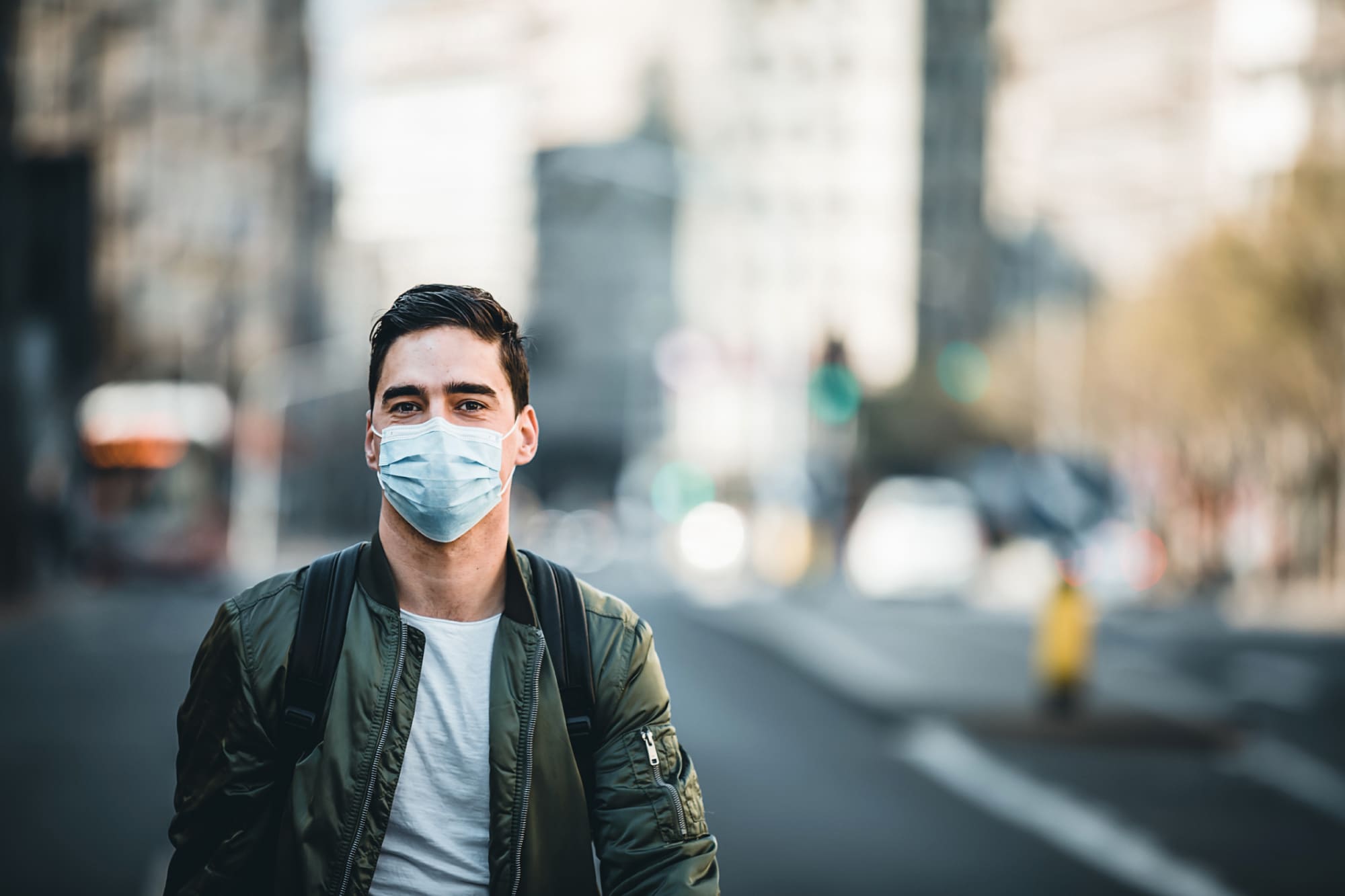 person wearing mask in the streets