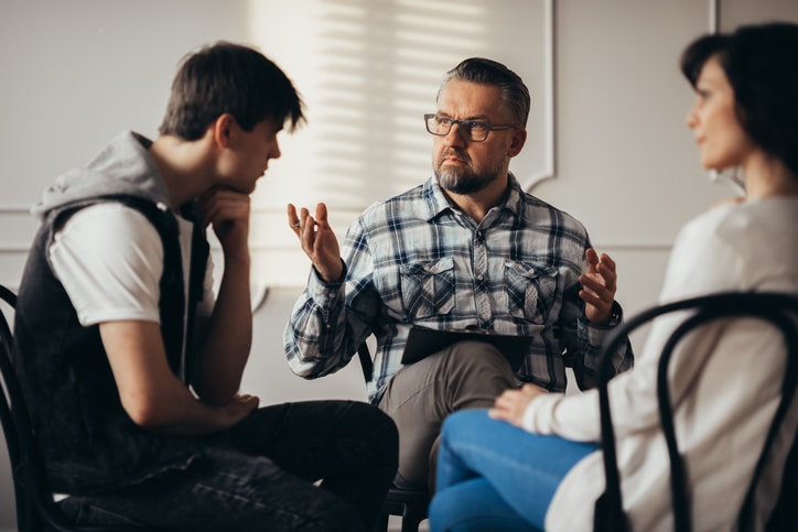 Family in counseling with child facing addiction