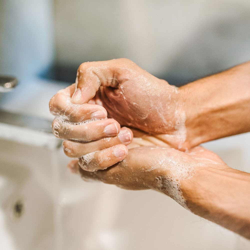 Understanding OCD: A person obsessively washing their hands.