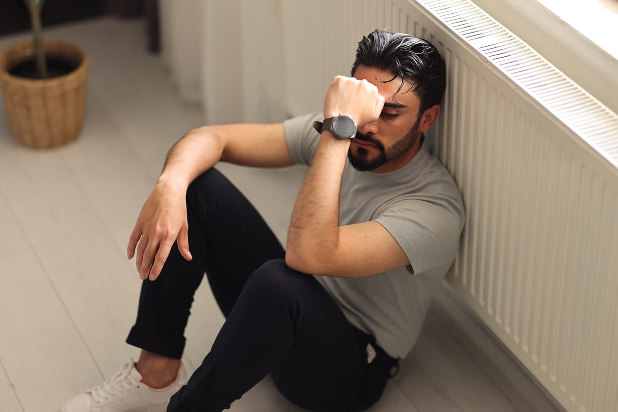 A man struggling with suicidal thoughts.